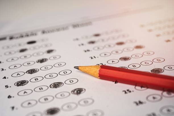 istock Answer sheets with Pencil drawing fill to select choice, education concept 1454641995