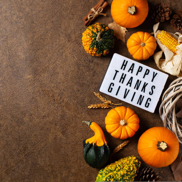 istock Autumn fall thanksgiving day composition with decorative pumpkins 1454643709