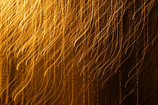 Twinkly golden pattern of strings