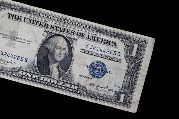 istock 1935 silver certificate US one dollar bill with blue seal. 1454648796