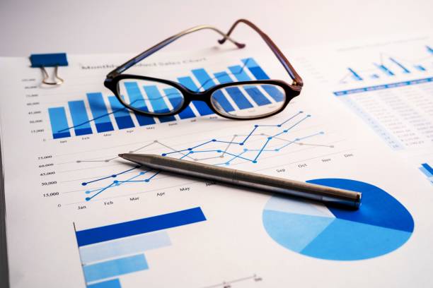 istock Graph with pen and glass. Finance development, Banking Account, Statistics Investment Analytic research data economy, trading, Mobile office reporting Business company meeting concept. 1454650868