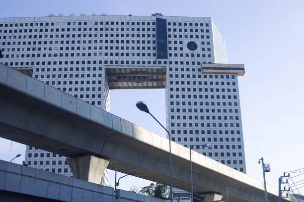 Local landmark Elephant office building in Bangkok Chatuchak behind new BTS skytrain line