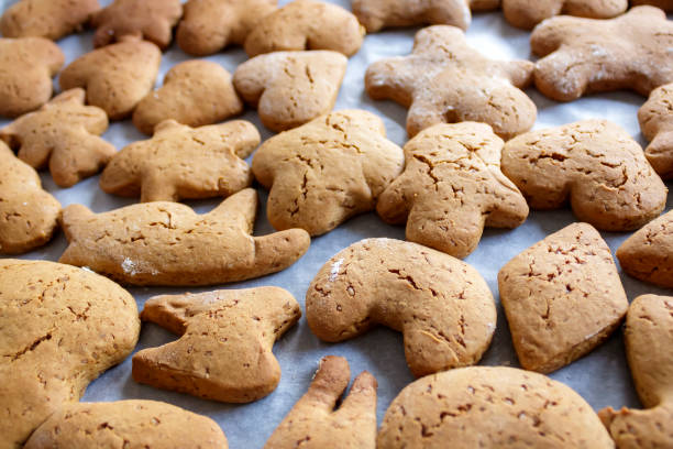 istock Freshly baked cookies on baking sheet 1454675262