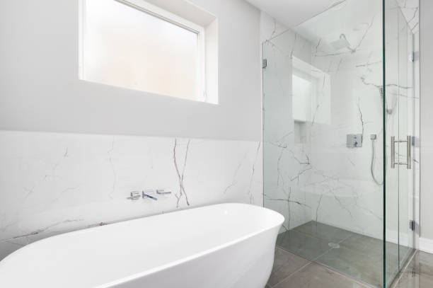 istock A luxury shower and freestanding bathtub in a modern bathroom. 1454675538