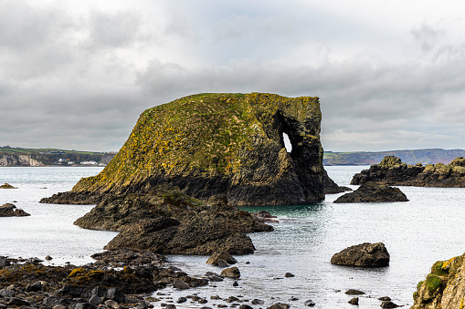 Elephant rock near Ballintoy Harbor a small Irish fishing village in the County Antrim,  Northern Ireland, UK