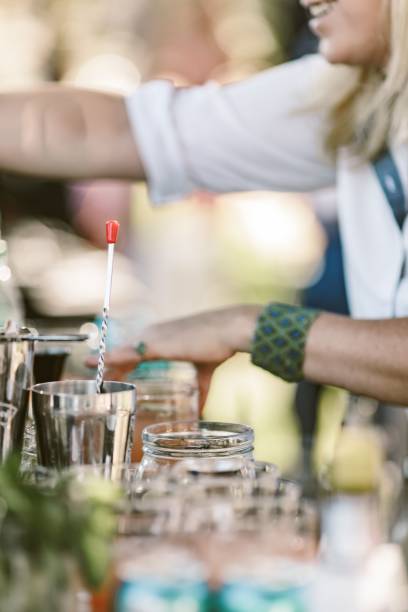 istock Bartender making cocktails outdoors 1454676802