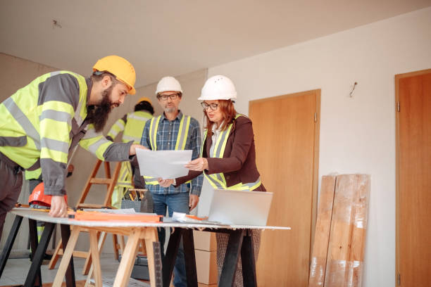 istock Team working on interior design on a meeting at site 1454688169
