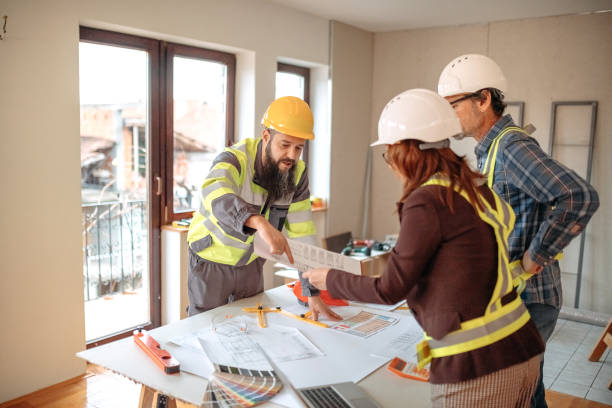 istock Team working on interior design on a meeting at site 1454688220
