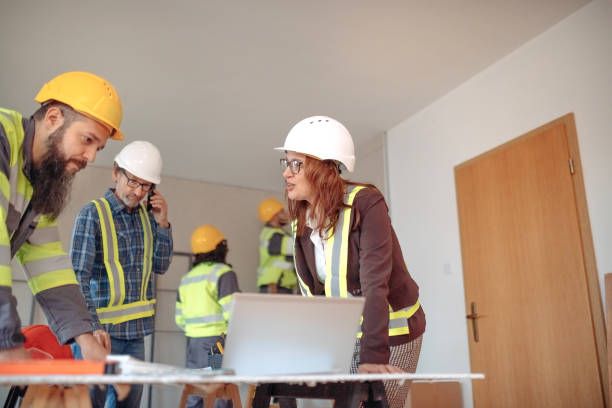 istock Team working on interior design on a meeting at site 1454688386