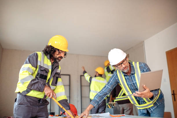 istock Team working on interior design on a meeting at site 1454688423