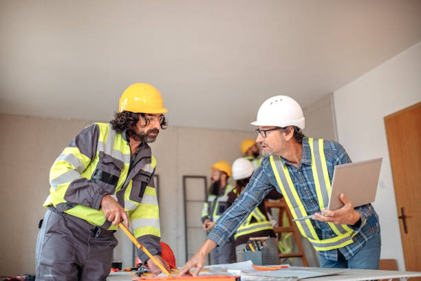 istock Team working on interior design on a meeting at site 1454688500