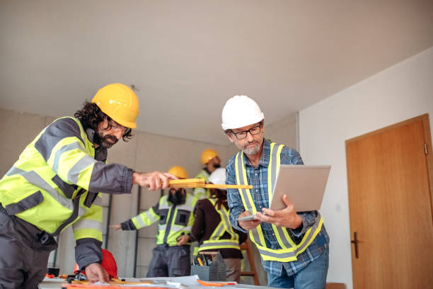istock Team working on interior design on a meeting at site 1454688501