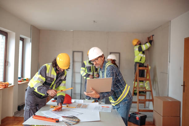 istock Team working on interior design on a meeting at site 1454688528