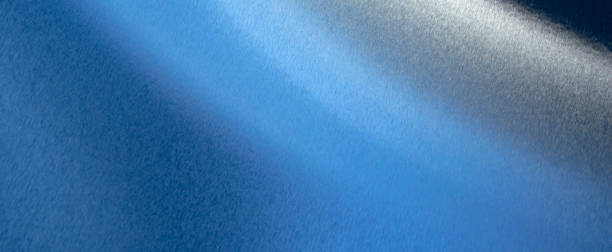 istock scratched blue metal sheet with visible texture. background 1454693470