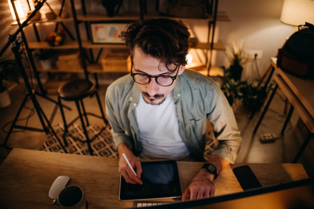istock Graphic designer works in his office 1454695221