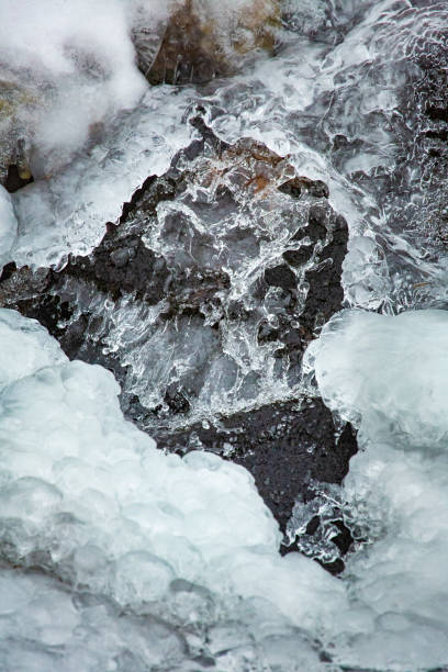 istock Stop action frozen waterfall at Goodwin State Forest in Connecticut. 1454695416