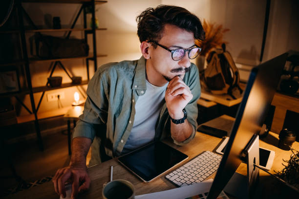 istock Graphic designer works in his office 1454695461