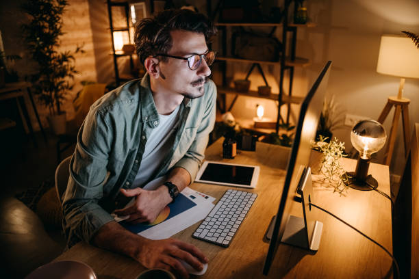 istock Graphic designer works in his office 1454696302
