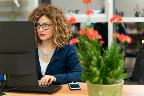 female officer working the evening shift in the office