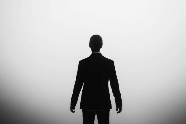 Silhouette of man stock photo