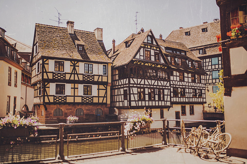 Summer trip to France. European country. French architecture. Film camera effect