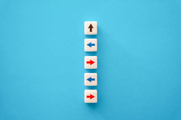 istock Disunity in the team. Arrows in different directions. 1454703746