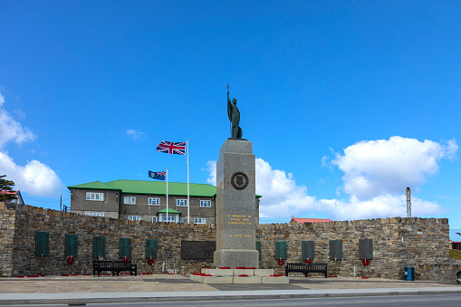 The 1982 Liberation Memorial, unveiled 1984, to the British and associated troops who liberated the Falkland Islands from Argentine occupation in 1982. Designed by Gerald Dixon, with a bronze Britannia sculpted by David Norris. Port Stanley, Falkland Islands