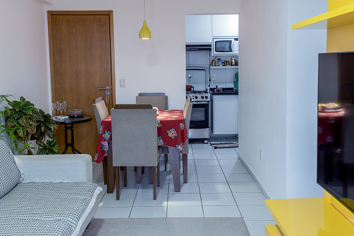 Recife, Pernambuco, Brazil:Living room, kitchen and rest room of a tiny and cozy residential apartment.