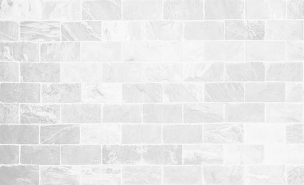 istock White grunge brick wall texture background for stone tile block painted in grey light color wallpaper modern interior and exterior and room backdrop design. Simple seamless pattern grid for backdrop. 1454721218
