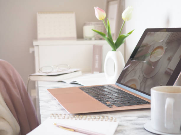 istock A laptop and a notebook in a stylish workspace 1454722655
