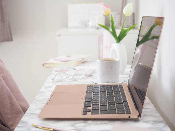 istock A laptop and a notebook in a stylish workspace 1454723887