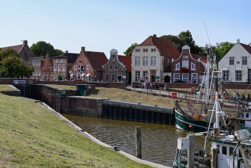 Greetsiel, East Frisia, Germany, September 4, 2022 - Fish trawler at the Old Greetsiel Seawater Trough (East Frisia)