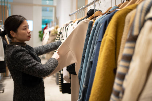 istock woman shopping for clothes 1454726466