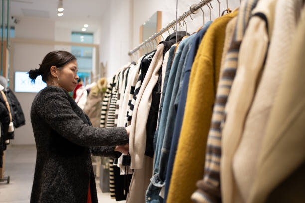 istock Asian woman is shopping for clothes 1454726498