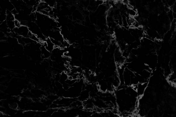 istock Marble texture in natuBlack marble texture with natural pattern for background or design artwork.ral pattern with high resolution bright and luxurious. 1454730212