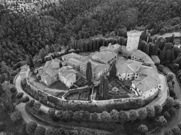 View of the castle in Sirmione (Castello Scaligero di Sirmione) one of the most spectacular and preserved fortresses on Lake Garda, province of Brescia, Italy. Black and white image.