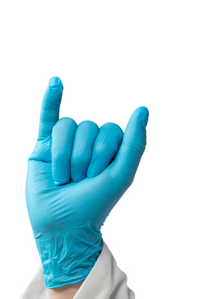 istock Isolated hand with a surgery glove doing the letter ¨y¨ with sign language 1454735481