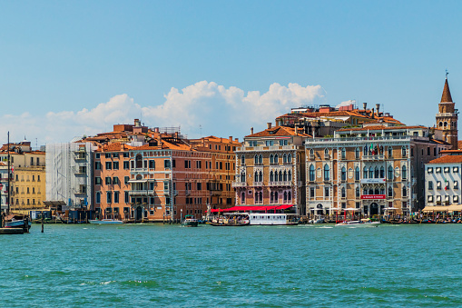 Venice, the capital of northern Italy’s Veneto region, is built on more than 100 small islands in a lagoon in the Adriatic Sea. It has no roads, just canals – including the Grand Canal thoroughfare – lined with Renaissance and Gothic palaces.