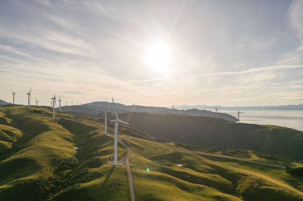 istock Windfarm over hills producing sustainable energy. 1454740329