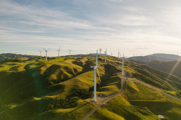 istock Wind turbine for generating electricity at dawn. 1454740335