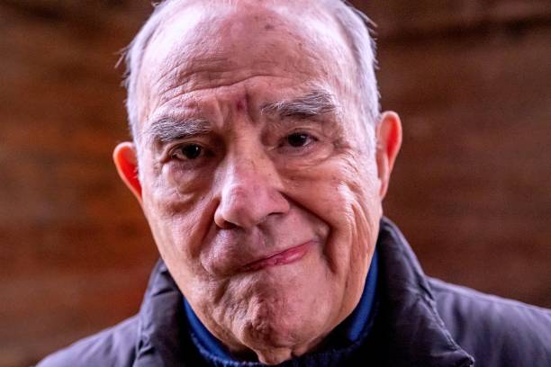istock Pensive, Serious Old hispanic man looking at the camera 1454746389