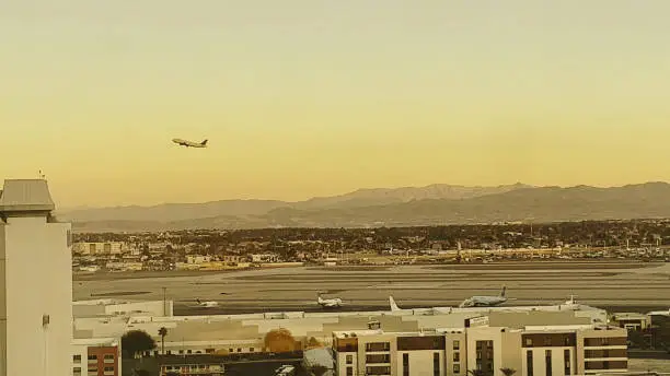 Photo of Las Vegas Hotel Window  Sunrise POV of Travel During Holiday Season McCarran International Airport in Winter Photo Series