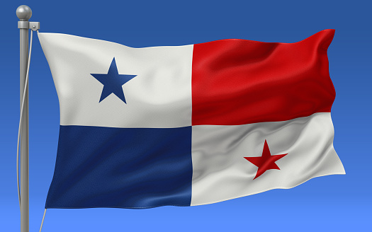 Panama flag waving on the flagpole on a sky background