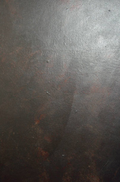 istock black metallic background in loft style with splashes of red 1454752953