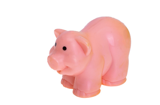 figurine of pink pig isolated on white background