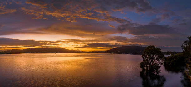 istock After the rain sunrise waterscape with clouds 1454759025