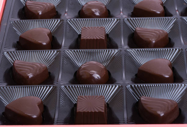 istock chocolate candies in a box close-up 1454760110