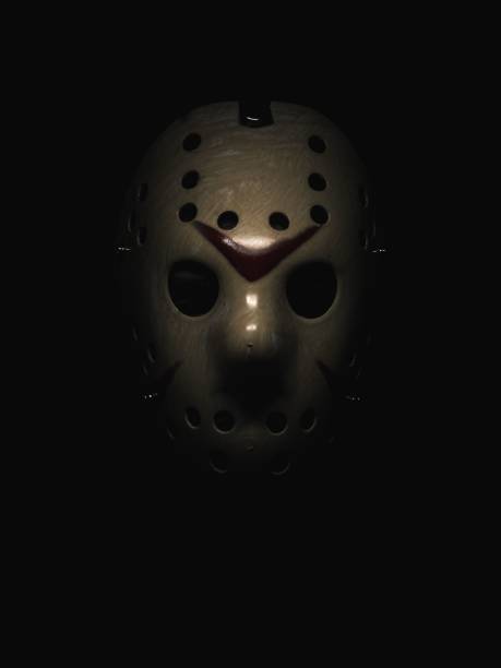 istock Vertical shot of a scary mask in darkness 1454765002