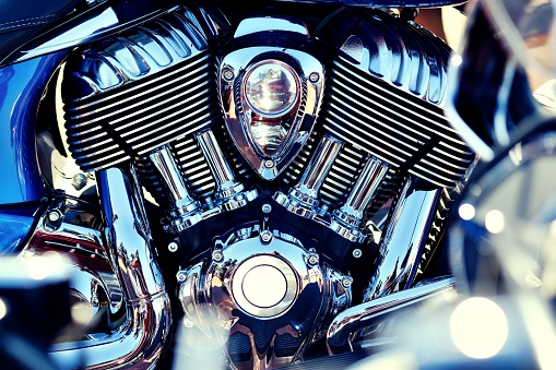 A closeup of a chrome motorcycle engine