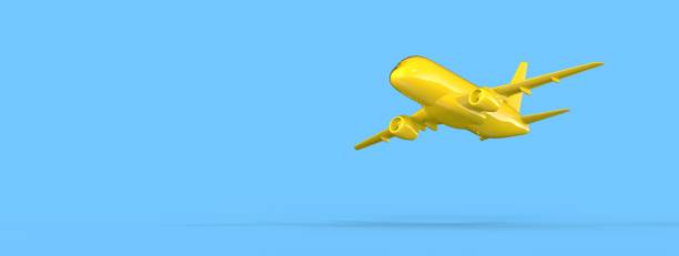 istock 3D rendered bright yellow airplane isolated on a vibrant blue background 1454767479
